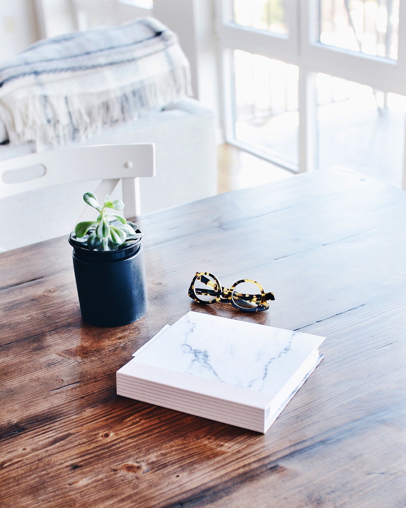 book, decoration, eyeglasses, wood - material, lay, eyewear, flay, green, wooden, food, potted plant, focus on foreground, flower, publication, no people