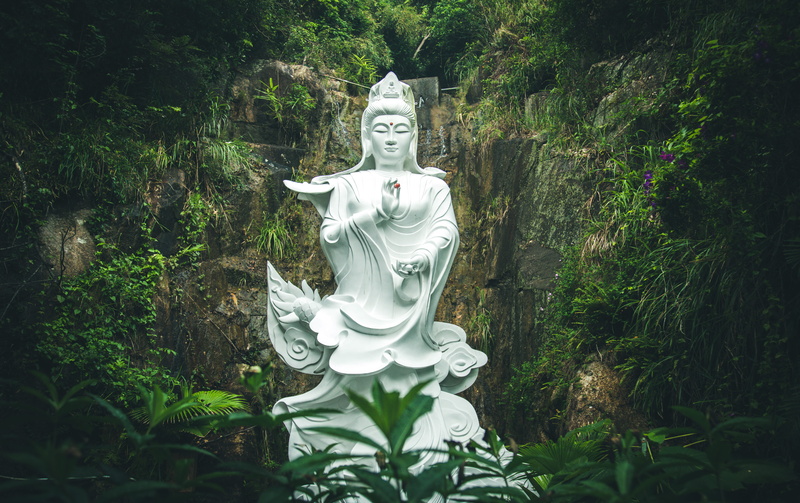 plant, person, outdoors, nature, vegetation, religion, housing, green color, spirituality, buddha, art and craft, human representation, 5K, temple, creativity