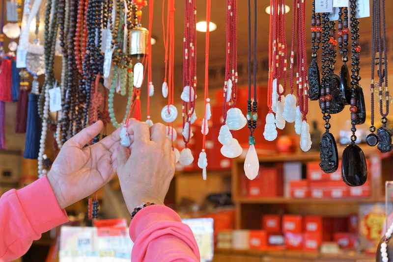 lantau, man, music, buying, daylight, retail display, buddhism, present, god, store, victory, human body part, a, large group of objects, iron, offer, hang