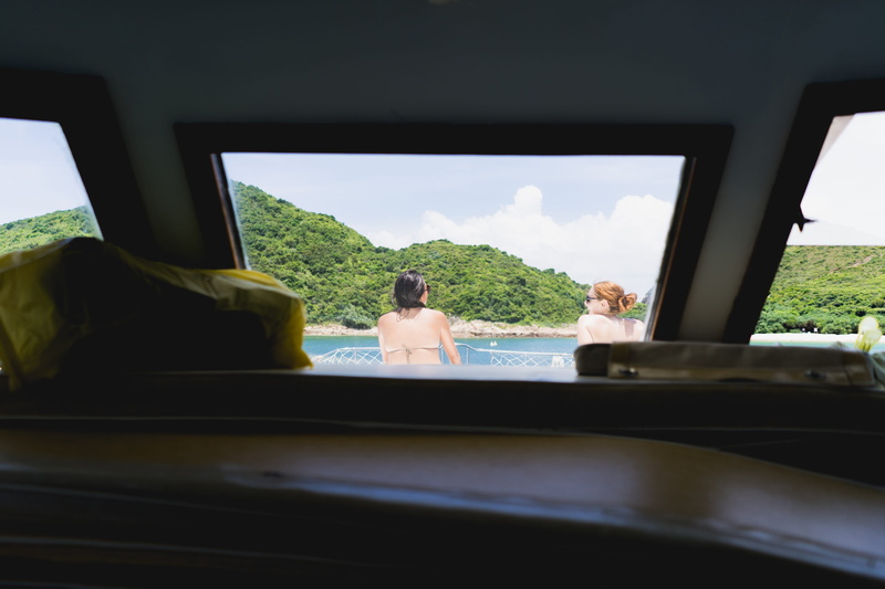 indoors, day, girls, hot, sky, leisure activity, rear view, sitting, beach, summer, transportation, vehicle interior, adult, transparent, boat, water, plant