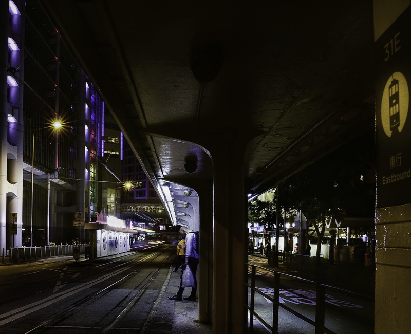 rail transportation, night, mode of transportation, railroad station platform, built structure, real people, hong kong dindin, incidental people, public transportation