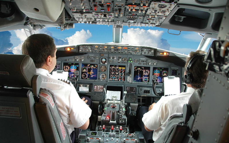 private Airplane, responsibility, two people, people, The plane, control panel, expertise, airplane seat, commercial Airplane, rear view, co-Pilot, technology