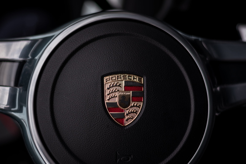 close-up, audio equipment, cover, technology, wealth, black background, emblem, logo, luxury, norway, extreme close-up, symbol, nikon, stereo, arts culture and entertainment