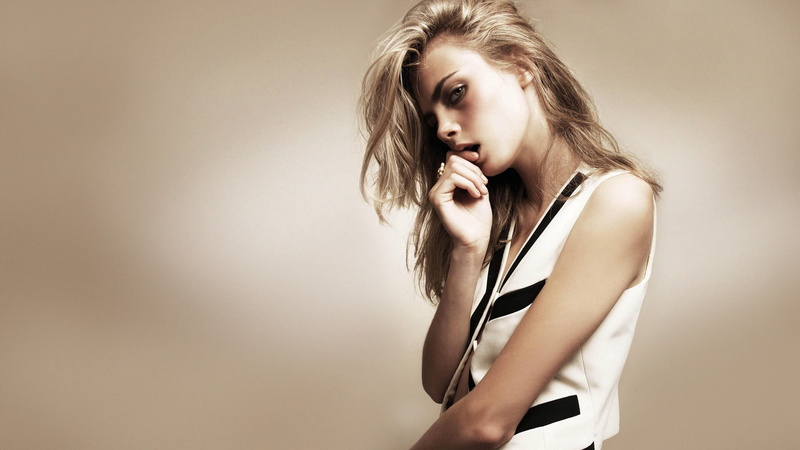 model, beige background, one person, long hair, adult, copy space, studio shot, hairstyle, blonde, contemplation, fashion, waist up, looking at camera