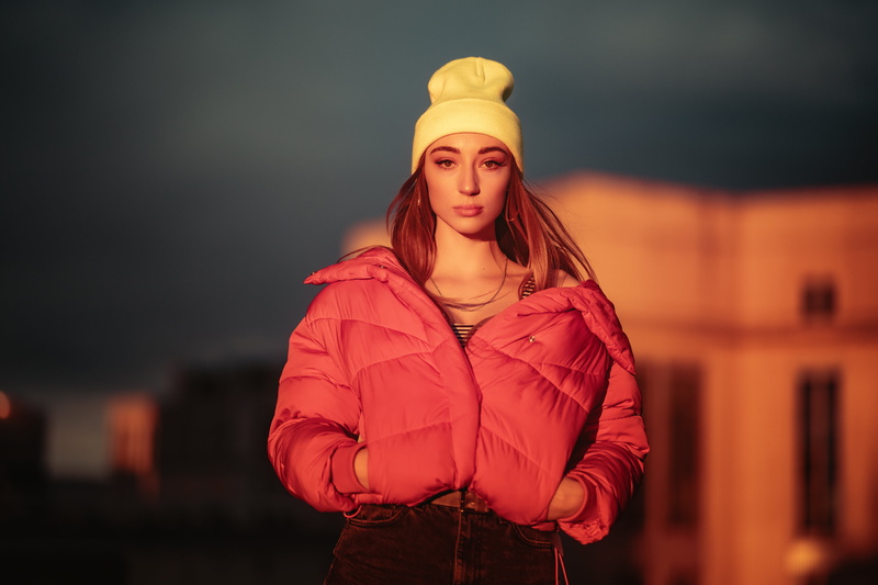 women, hands in pockets, necklace, Wool cap, portrait, brunette, long hair, hoop earrings, sunset, frontal view, model, 4K, jeans, straight hair, fashion