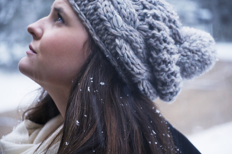 cap, warm clothing, apparel, close-up, headshot, jacket, 4K, hair, brunette, person, gray, focus on foreground, hat, one person, beauty, waering, knitted