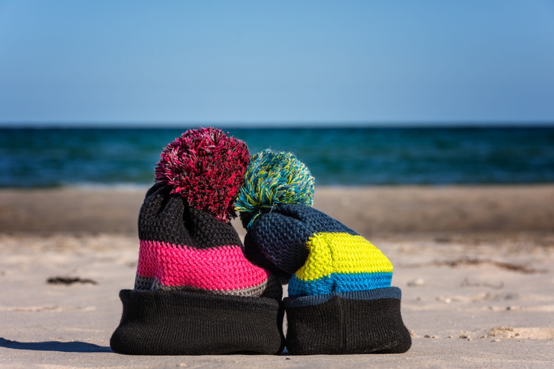 hat, warm clothing, knitted, baltic sea, no people, outdoors, water, blue, horizon over water, bobble hat, beauty in nature, beach, focus on foreground