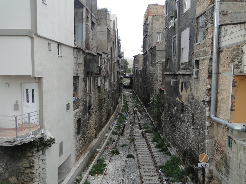 urban Scene, building exterior, built structure, 2K, no people, train, piraeus, city, day, direction, nature, alley, wall - building feature, window, old