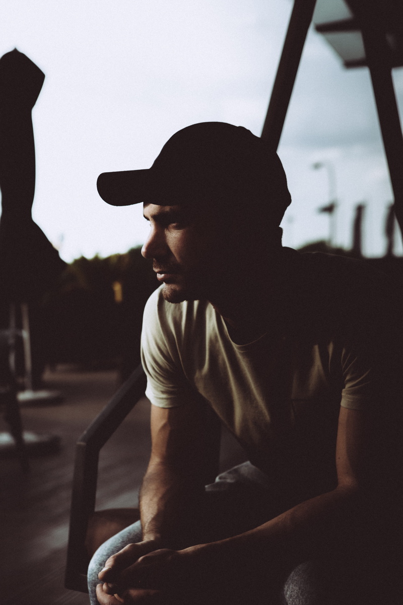 contemplation, working out, portrait, real people, sport, sun hat, daytime, nature, men, baseball cap, outdoors, undershirt, sleeve, hat, cap, three quarter length