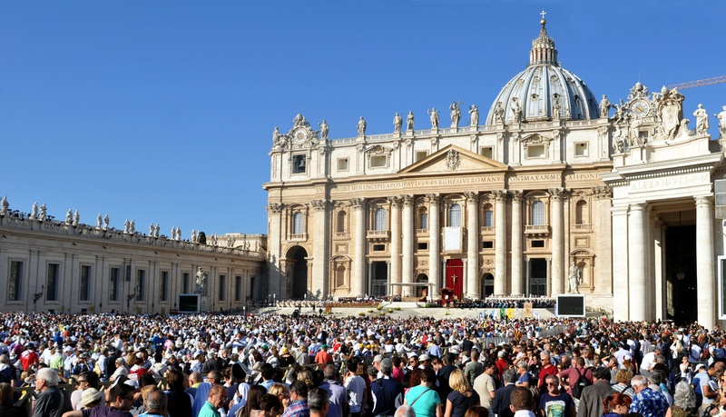 travel destinations, group of people, crowd, pope, architectural column, men, religion, clear sky, mass, tourism, vatican city, architecture, built structure