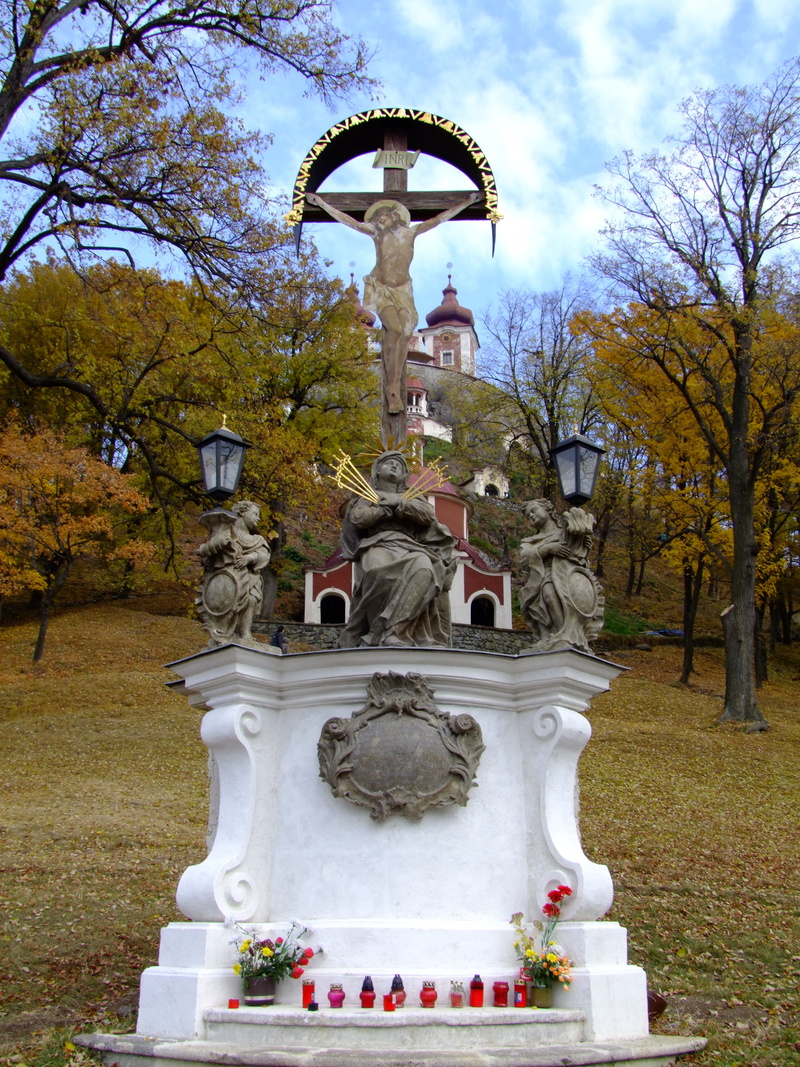 nature, statue, flower, outdoors, representation, belief, day, art and craft, sky, monument, christianity, park, park - man made space, plant, sculpture