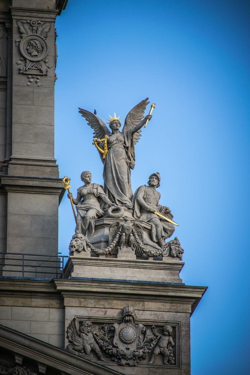 architecture, art, animal wing, built structure, nature, human representation, history, art and craft, blue, prague, statue, female likeness, museum, creativity