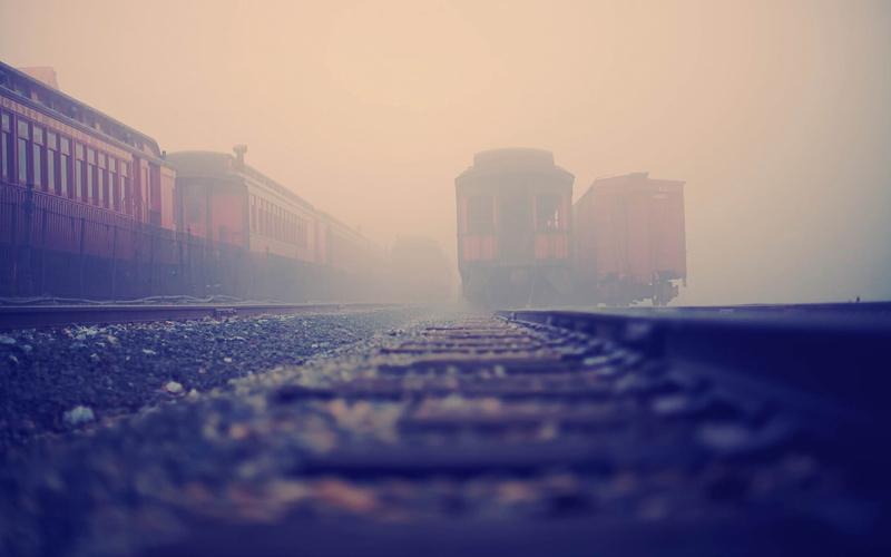 urban Scene, train, city, clear sky, fog, cityscape, sky, train - vehicle, surface level, mode of transportation, architecture, sunset, dusk, sunrise - Dawn