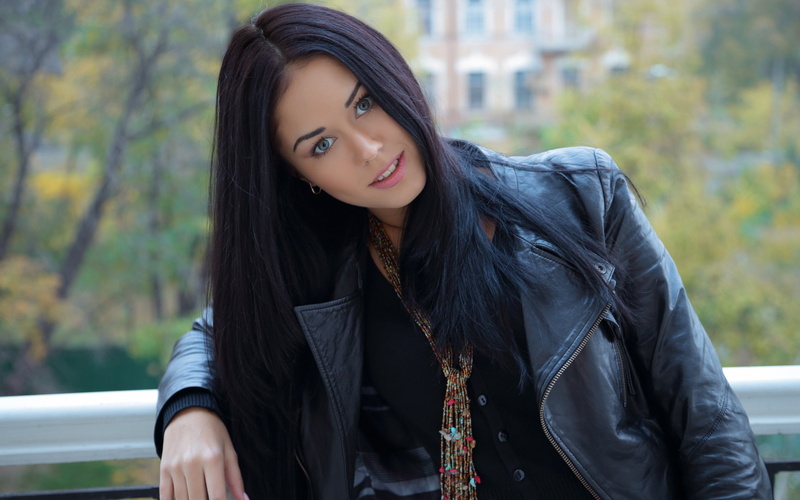 long hair, scarf, fashion, looking at camera, focus on foreground, leather, macy b black hair women balconies looking at viewer smiling, day, beautiful woman