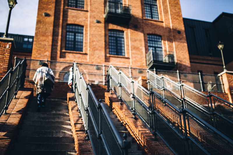 outdoors, bricks, women, city, windows, town, railing, day, łódź, window, Revitalized, real people, buildings, track, men, Loft, people, rear view, building Exterior