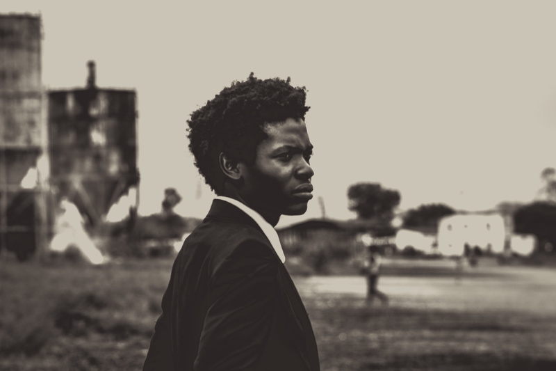 suit, day, man, ghetto, young adult, men, tie, profile view, long, standing, nature, casual clothing, hairstyle, white, sky, young, black, outdoors, photo