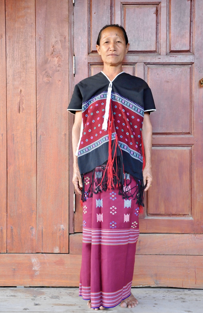 burma, 2K, wall - building feature, garment, one person, looking at camera, endangered population, wood - material, door, ethnic group, front view, beauty