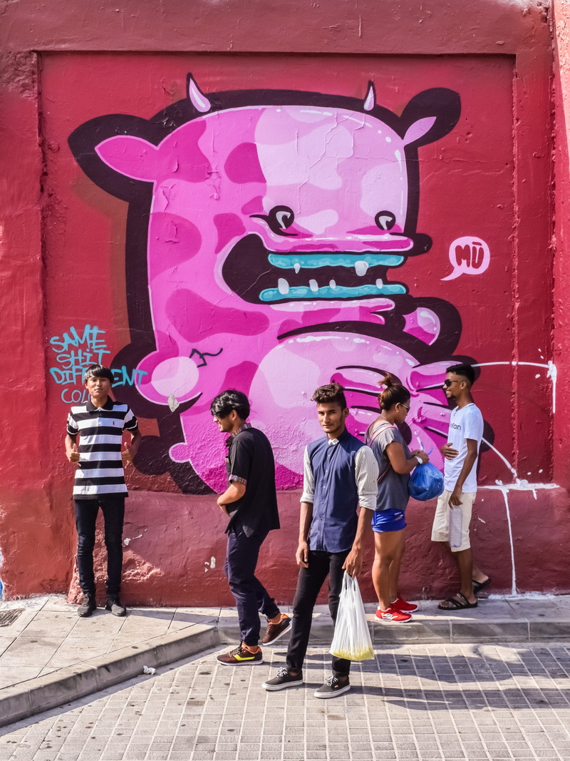 standing, immigrants, medium group of people, architecture, group of people, full length, art and craft, pink color, creativity, childhood, sunday gathering
