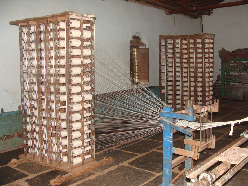 building exterior, thread, pattern, weaving, staircase, yarn making, hand loom, tradition, 2K, window, garag, sunlight, coarse cloth, no people, building