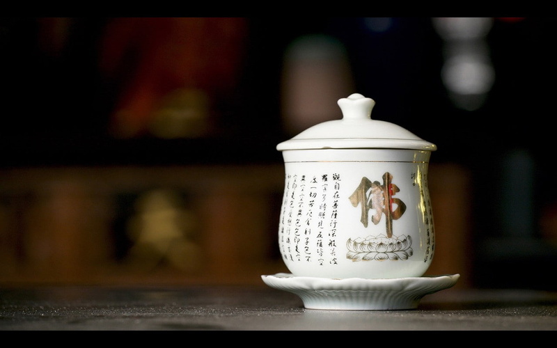 indoors, table, focus on foreground, Chinese, pattern, tea cup, mug, 720P, container, still life, jar, hot drink, cup, food and drink, single object, no people