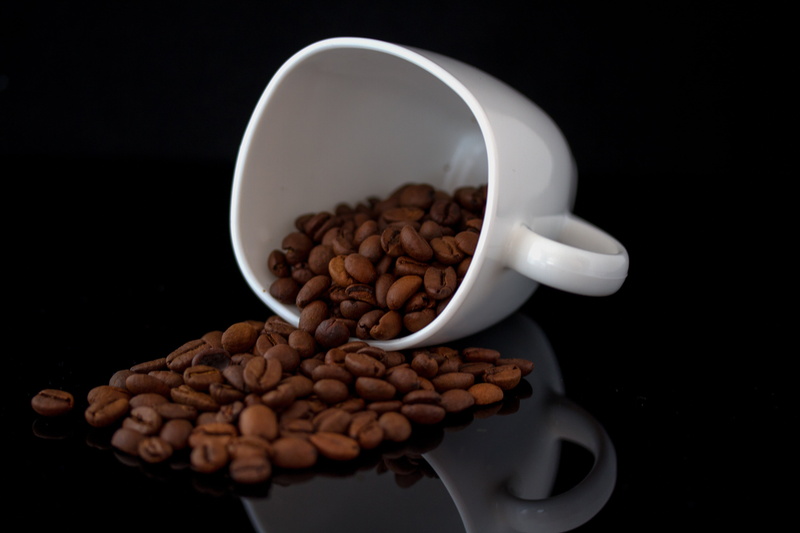 roasted coffee bean, 5K, freshness, dark, porcelain, spilling, coffee cup, coffee mugs, caffeine, abundance, cup, spilled, black background, black, food
