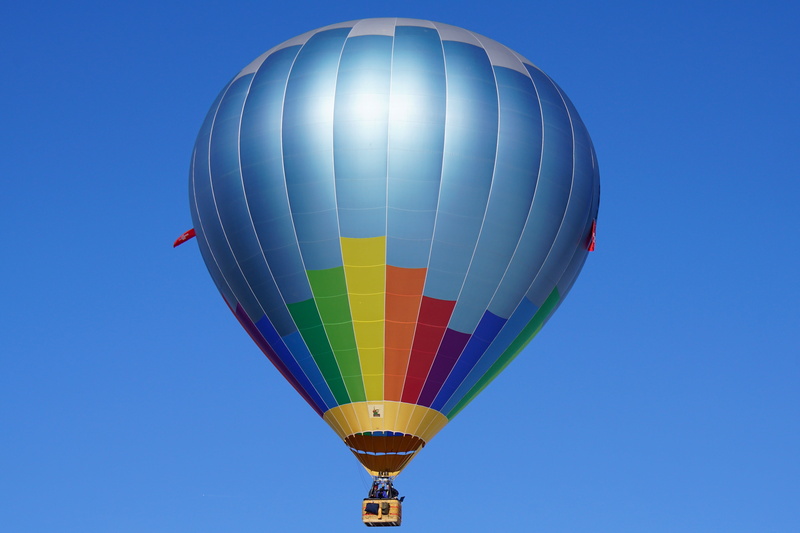 burner, air vehicle, ballooning festival, outdoors, balloon fly, mid-air, excitement, single object, orange, aviation, white, mode of transportation, multi colored