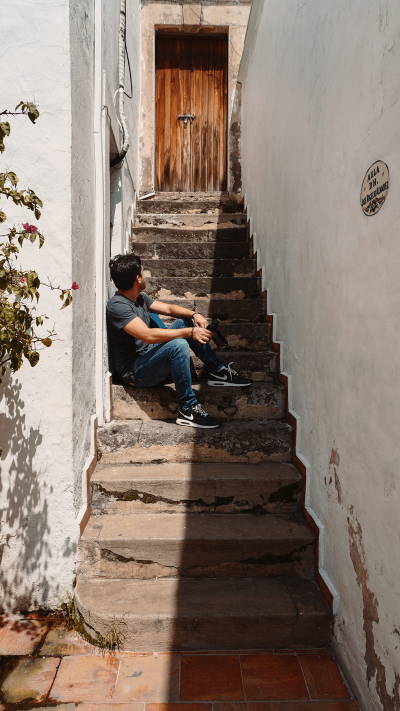 stairs, thule, outdoors, wall - building feature, lifestyles, osmo, entrance, boy, building, mexico, 5K, nike, full length, trip, one person, sitting
