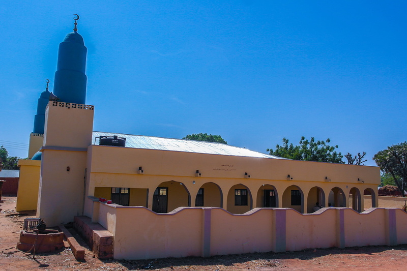 religion, tower, clear sky, villa, built structure, lighthouse, shelter, sky, hotel, building, monastery, soil, hacienda, steeple, belief, dome, tree, nature