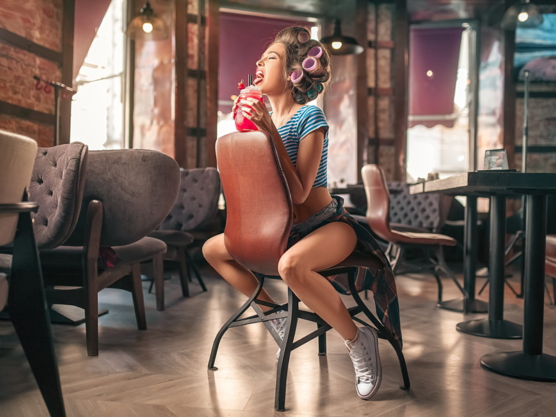 fashion, hairstyle, sneakers, hair, full length, cafe, brunette, real people, beauty, Converse, blonde, young adult, indoors, seat, closed eyes, flooring
