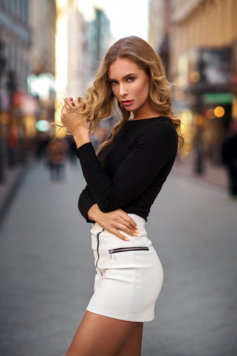 1080P, portrait display, blue eyes, looking at viewer, bokeh, black clothing, painted nails, short shorts, urban, depth of field, women outdoors, women