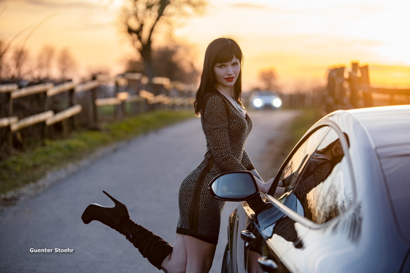 heels, high heeled boots, 1080P, boots, lipstick, road, legs up, vehicle, Guenter Stoehr, women, women with cars, red lipstick, outdoors, dark hair, looking at viewer