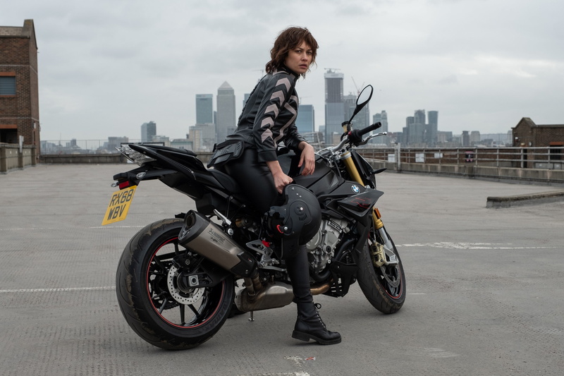 Olga Kurylenko, motorcycle, The Courier, pose, 2K, look, figure, hair, motorcycle helmet in hand, Courier, bike
