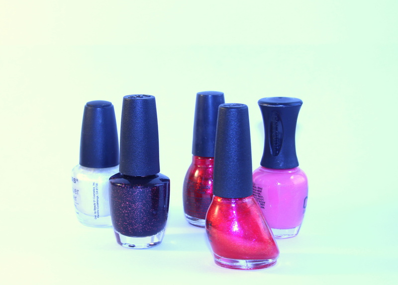 nail polish, container, manicure, still life, studio shot, wall - building feature, beauty product, polish, three objects, assorted, variation, close-up