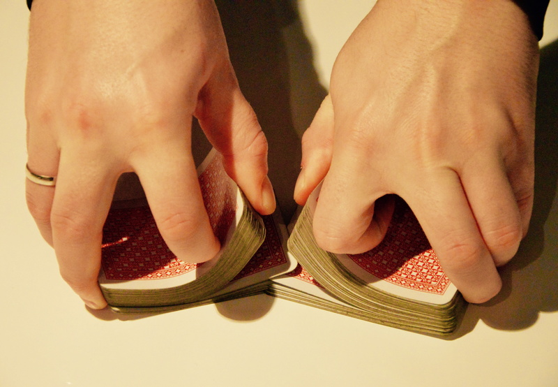 lifestyles, toenail, shuffling, human limb, chance, nail polish, low section, gamble, leather, gambling, deck, playing, studio shot, women, indoors, shuffle