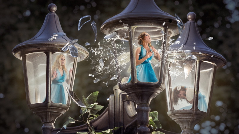 one person, building exterior, lantern, adult, blue, table, dress, human representation, lighting equipment, retail, representation, gas lamps, lamps, nature