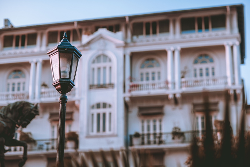 residential district, architecture, lampshade, focus, window, banister, tire, building exterior, nature, shutter, curtain, outdoors, lighting equipment