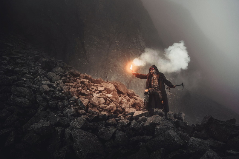 mountains, real people, mountain, smoke, rock, one person, nature, tranquility, sky, rock - object, land, solid, full length, winter, fog, outdoors, cloak