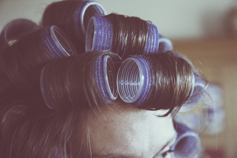 focus on foreground, blue, rollers, headshot, hair cut, pinned up, close-up, blow-dry, wedding, child, women, looking through an object, hair, insert, face