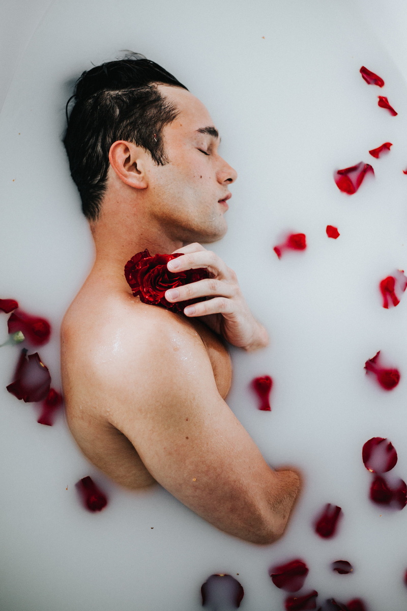 hairstyle, shirtless, 4K, rest, eyes closed, headshot, milk, human body part, petals, love, milk bath, indoors, high angle view, bath, ughhh, young adult