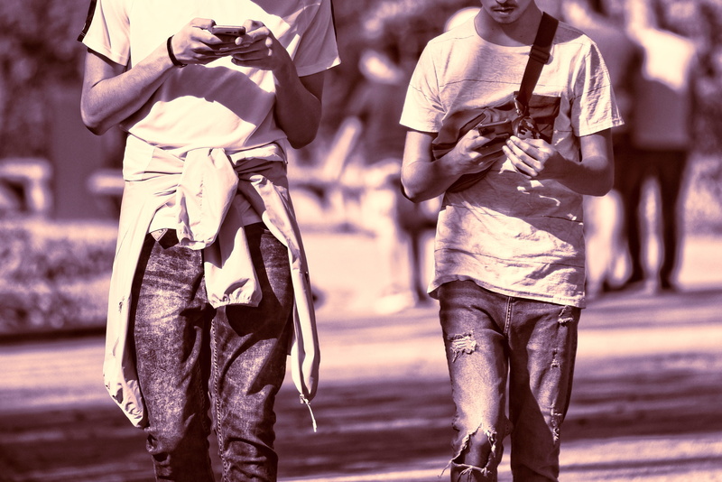 together, city street, road, architecture, smartphone, guys, two, hand, focus on foreground, obsession, side by side, sunny day, clothing, person, friends