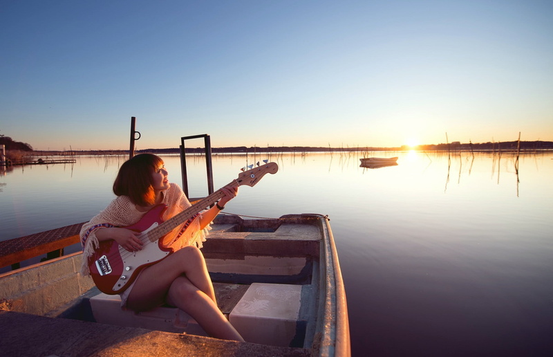 playing, musician, string instrument, acoustic guitar, water, guitar, leisure activity, 1080P, young adult, young women, nature, women, sun, sitting, one person