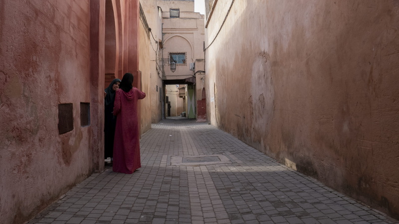 real people, meknes, town, cobblestone, footpath, walkway, adult, standing, building exterior, building, walking, direction, architecture, the way forward