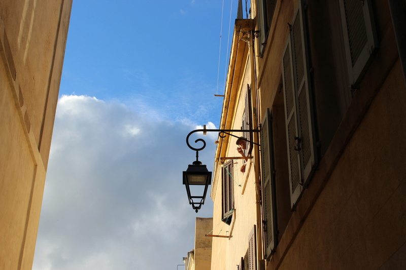 sky, wall - building feature, city, no people, rue, building, outdoors, lampadaire, street light, window, day, architecture, street, built structure, cloud - sky