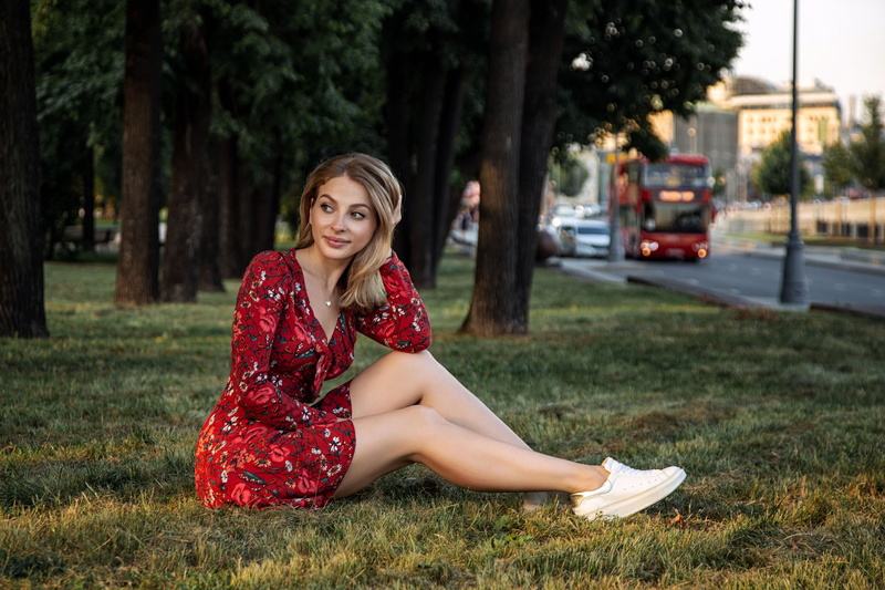 sneakers, trees, sunlight, model, sky, city, grass, brunette, Red dress, dress, sitting, Street, Oleg Klimin, bus, 2K