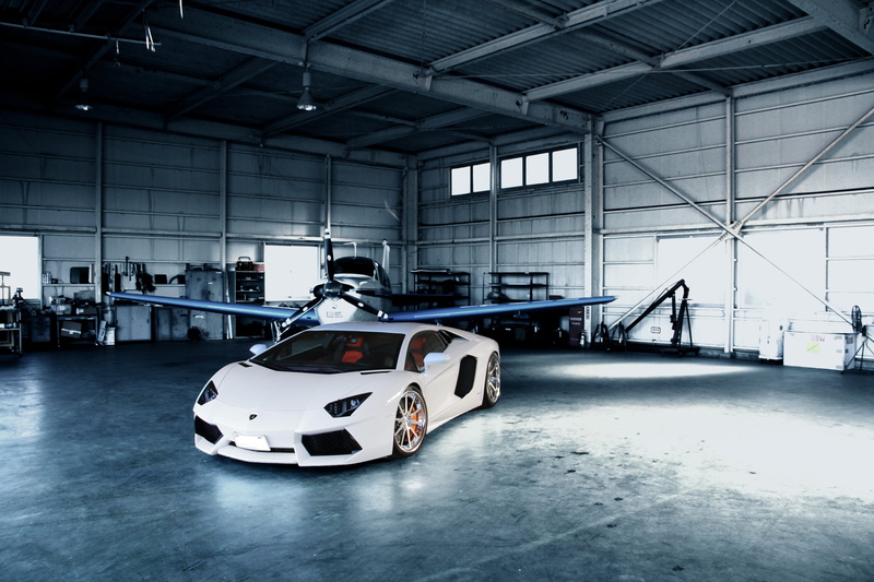 absence, day, reflection, empty, motor vehicle, transportation, sport, built structure, car, mode of transportation, white, no people, warehouse, hangar