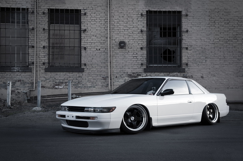 coupe, city, grid, wealth, sports car, vintage car, garage, Nissan, luxury, mode of transportation, brick, stationary, no people, building exterior, land vehicle