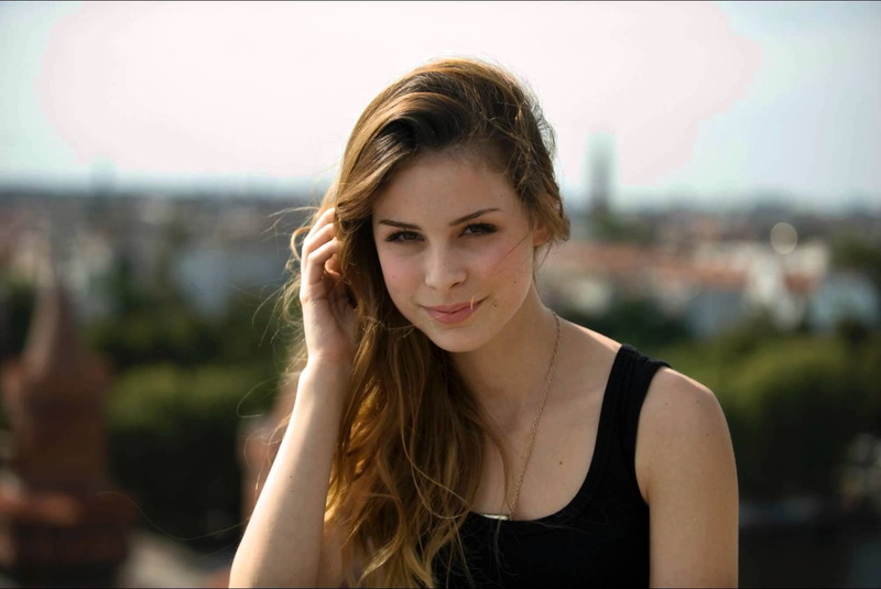 beautiful woman, headshot, tank top, outdoors, human hair, looking at viewer, beauty, casual clothing, women, young adult, adult, depth of field, smiling
