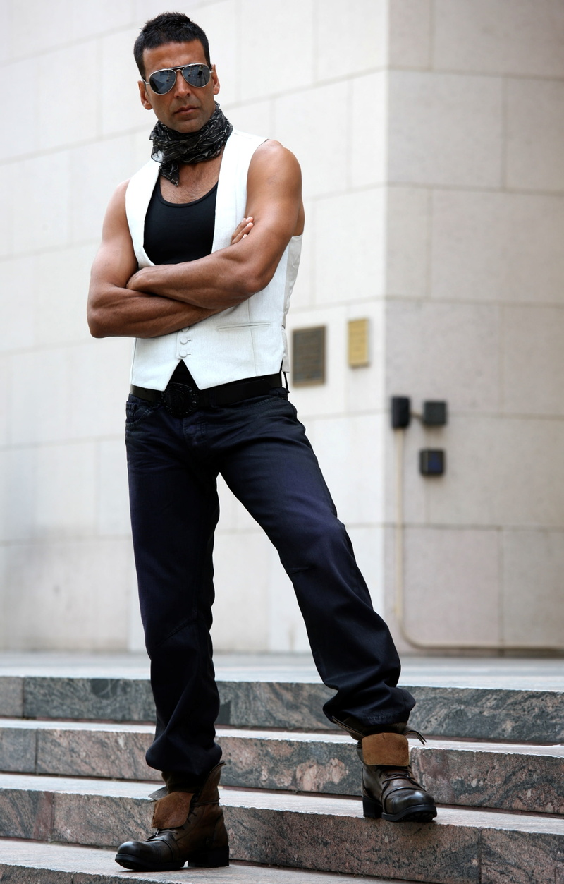 mid adult, males, akshay, 2K, clothing, kumar, dashing, city life, one person, front view, look, architecture, portrait, adult, standing, serious, men