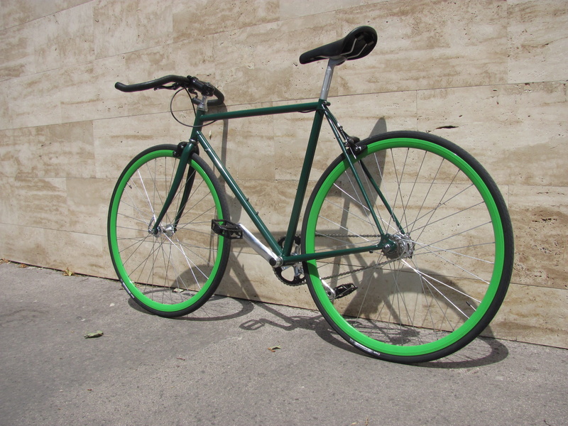 architecture, nature, land vehicle, Bicycle, city, peugeot frame, cycle, parking, day, steel frame, side view, environment friendly, footpath, green color