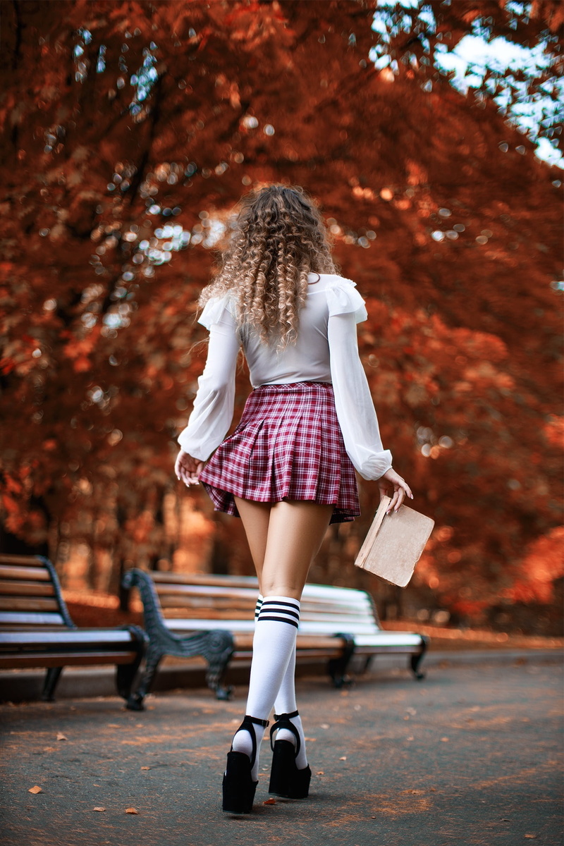 1080P, miniskirt, white shirt, brunette, wavy hair, neckline, model, park, trees, school skirt, striped socks, walking, high heels, shirt, Maxim Romanov